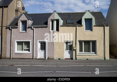 Terraced houses painted cream, Stornoway, Outer Hebrides Stock Photo