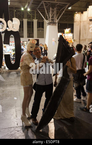 Pyramid Head and Nurse from Silent Hill at Barcelona International Comic Fair on May 17, 2014 in Barcelona, Catalonia, Spain. Stock Photo