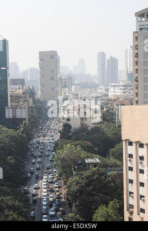 view along Dr Gopalrao Deshmukh Marg (Pedder Road) towards Kemp's Corner and the center of Mumbai city Stock Photo