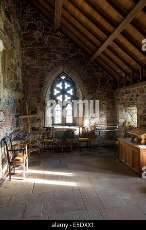 The interior of Iona Abbey, an historic abbey located on the Isle of Iona, just off the Isle of Mull. It is one of the oldest Stock Photo