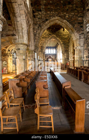 The interior of Iona Abbey, an historic abbey located on the Isle of Iona, just off the Isle of Mull. It is one of the oldest Stock Photo