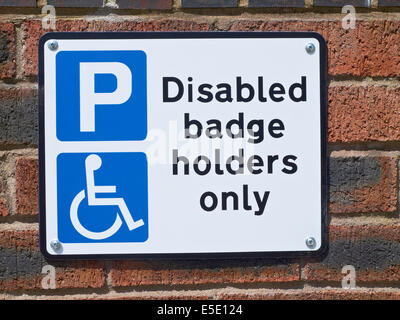 Disabled badge holders only parking sign UK Stock Photo