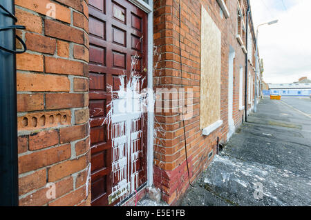 Belfast, Northern Ireland. 29th July, 2014. The homes of three Slovakian familes were attacked, windows broken on houses and cars, and racist graffiti sprayed on around a dozen walls. Around six masked men carried out the attack around 11pm. Nobody was hurt in any of the attacks. Credit:  Stephen Barnes/Alamy Live News Stock Photo