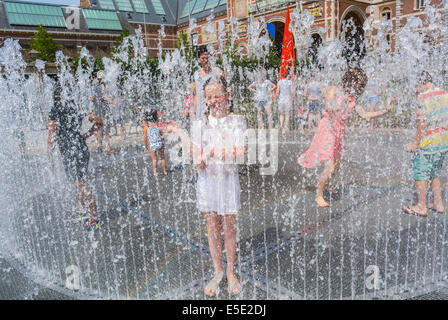 Amsterdam, Holland, The Netherlands, Tourist Children Cooling off in Public Garden Fountains during Summer Heat Spell, people urban public Stock Photo