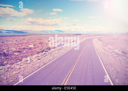 asphalt country road with back light, vintage style Stock Photo