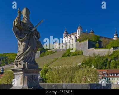 Saint Kilian on Old Main bridge with Fortress Marienberg in Würzburg, Germany Stock Photo