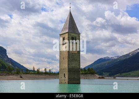 The bell tower in Reschensee, at the border of Italy and Austria Stock Photo