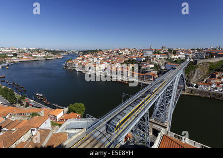 View over river Douro in Porto Northern Portugal and Dom Luis I bridge a two-hinged double-deck arch bridge Stock Photo