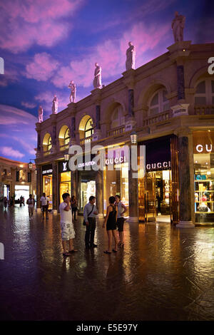 Interior of the Caesars Forum Shops shopping mall with Gucci and Louis  Vuitton shop fronts Las Vegas Nevada USA Stock Photo - Alamy