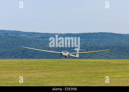 Glider landing at Harris Hill Soaring Center in Horseheads near Elmira New York Stock Photo