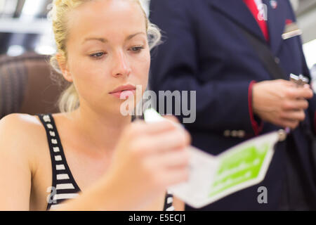 Train ticket check. Stock Photo