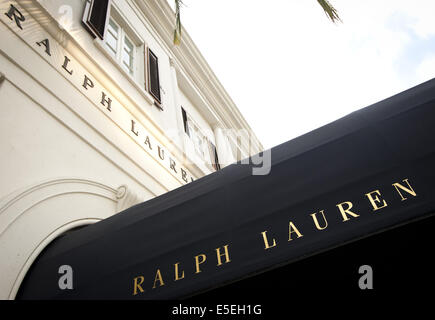 June 21, 2014 - Beverly Hills/Los Angeles, California, U.S - Ralph Lauren opened his first boutique, 'Polo,' on Rodeo Drive in 1971.  Lauren, working as a tie salesmen, designed his own tie using rags and remnants, he quit his job and sold his ties on his own using 'Polo' as a brand name. ---Rodeo Drive, in the heart of Beverly Hills, is a two-way, two mile long, north south city street with a mix of small to large luxury homes, city parks and green areas as well as world class high end signature flagship stores and shops with globally known luxury goods at it's south end.---Beverly Hills, ran Stock Photo