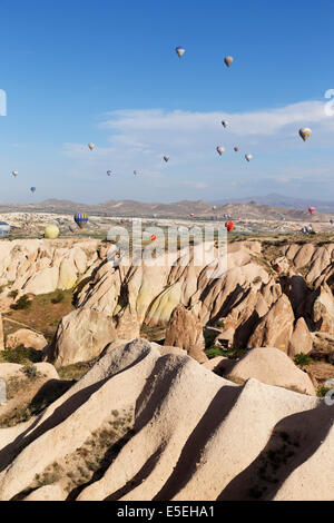 Hot air balloons, tufa formations at Sunset View Point, Göreme National Park, Cappadocia, Central Anatolia Region, Anatolia Stock Photo