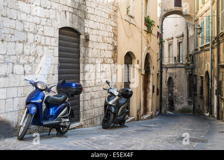 Italian motor scooter in typical italian village Stock Photo