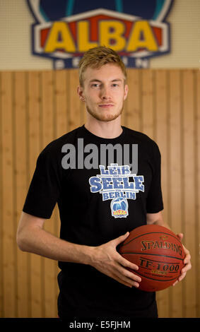 New player of German Bundesliga basketball team ALBA Berlin Niels Giffey poses in Berlin, Germany, 30 July 2014. Giffrey will play for ALBA for the next three years. Photo: Joerg Carstensen/dpa Stock Photo