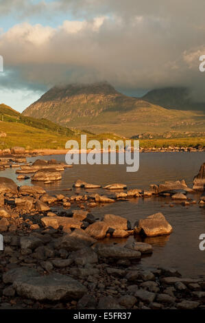 Storm Clouds approaching Sgorr Tuath on Loch Lurgainn Stock Photo