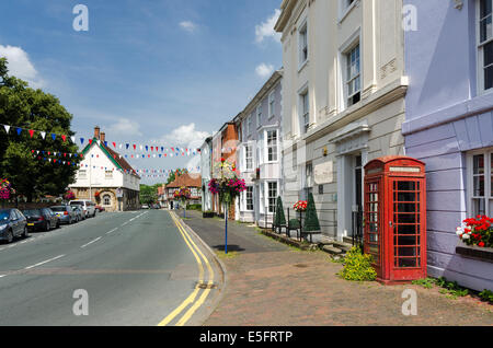 Church Street in the Warwickshire town of Alcester with the old twon hall on the left and Georgian houses on the right Stock Photo