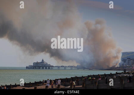 Eastbourne, East Sussex, UK. 30th July, 2014. Fire breaks out in the arcade building at Easbourne Pier on the Sussex Coast © Credit:  David Burr/Alamy Live News Stock Photo