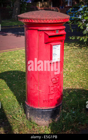 Royal Mail red post box in England Stock Photo