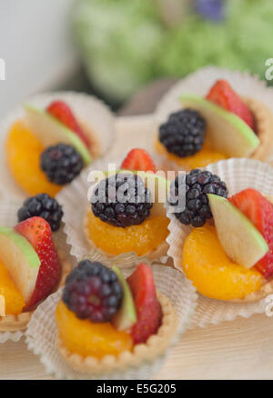 Fruit filled mini tarts Stock Photo