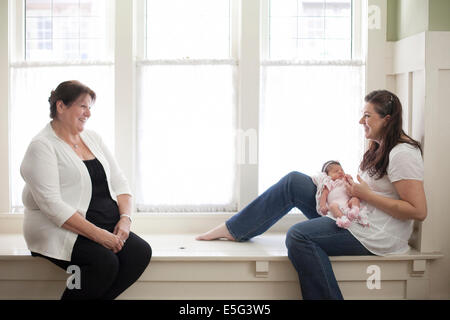 Grandmother with daughter and newborn granddaughter (0-1 month) Stock Photo