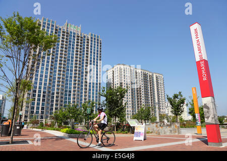 Romare Bearden Park, with residential towers in background, Charlotte, North Carolina, USA Stock Photo