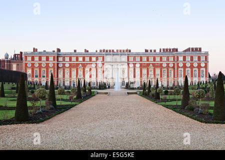 The Christopher Wren facade and gardens of Hampton Court Palace, Surrey, England