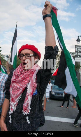 Montreal, Canada. 30th July, 2014. Montrealers took onto the streets to protest against the continious bombing of the Gaza strip which is resulting in a growing number of Palestinian civilian casulaties. Credit:  Megapress/Alamy Live News Stock Photo