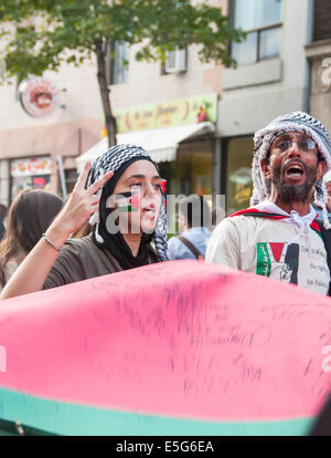 Montreal, Canada. 30th July, 2014. Montrealers took onto the streets to protest against the continuous bombing of the Gaza strip which is resulting in a growing number of Palestinian civilian casualties. Credit:  Megapress/Alamy Live News Stock Photo