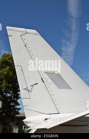 Tail fin tailplane / tail plane with white cross on red background of a ...