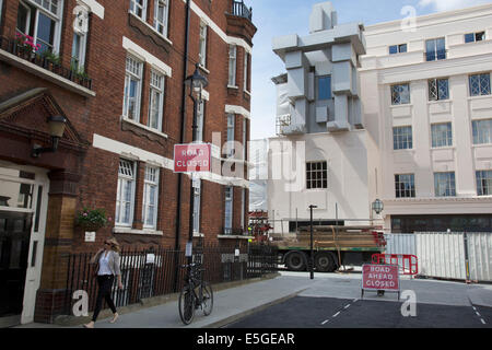 New Beaumont Hotel in London, UK. 'Room' a crouching figure by British artist Antony Gormley. Stock Photo