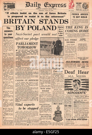 1939 Daily Express front page reporting British government's pledge to stand by Poland if they are attacked Stock Photo