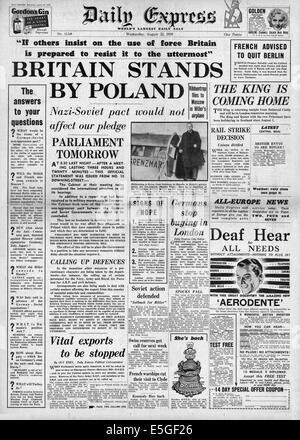 1939 Daily Express front page reporting British government's pledge to stand by Poland if they are attacked Stock Photo