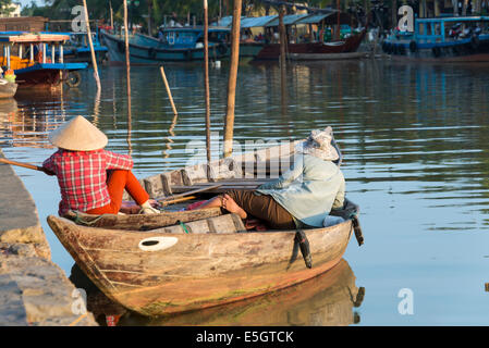 Boats on the Thu Bồn River, Hoi An, Quang Nam province, Socialist Republic of Vietnam. Stock Photo
