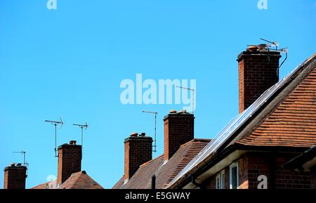 Chimneys on a housing estate Nottingham England uk Stock Photo