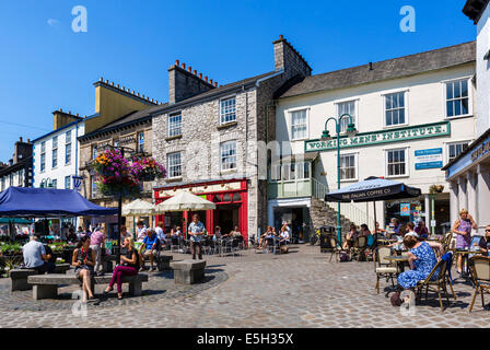 Shops and cafes in the Market Place in the centre of Kendal, Lake District, Cumbria, UK Stock Photo