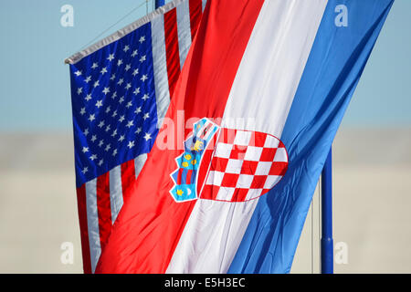 Croatian and American national flags waving. Stock Photo