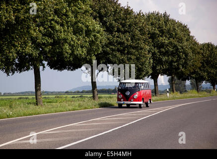 VW Microbus on a road in Germany Stock Photo