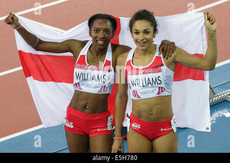 Hampden Park, Glasgow, Scotland, UK, Thursday, 31st July, 2014. Bianca Williams, England, left, wins Bronze and Jodie Williams, England, right wins Silver in the Women's 200m Final at the Glasgow 2014 Commonwealth Games Stock Photo