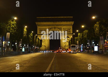 Arc de Triomphe lit up at night on Avenue des Champs Elysees Paris Stock Photo