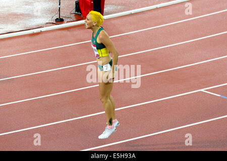 Hampden Park, Glasgow, Scotland, UK, Thursday, 31st July, 2014. Shannon McCann of Australia celebrates after qualifying from Round 1 of the Women's 100m Hurdles at the Glasgow 2014 Commonwealth Games Stock Photo