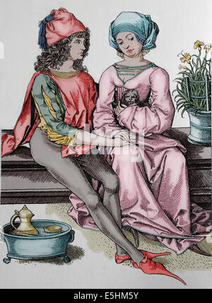 Europe. German couple,1480. Engraving, 19th century. Later colouration. Stock Photo