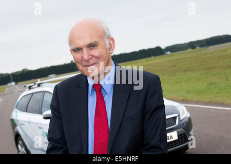 Business Secretary Vince Cable visiting MIRA (Motor Industry Research Association) to take a drive in the driverless car Stock Photo