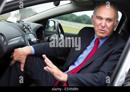 Business Secretary Vince Cable visiting MIRA (Motor Industry Research Association) to take a drive in the driverless car Stock Photo