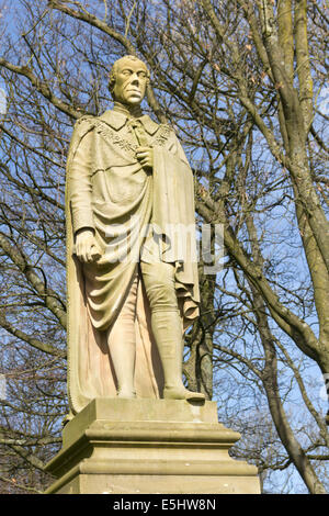 A statue of Benjamin Disraeli in Queens Park, Bolton. Disraeli (1804-1881) was twice prime minister of the United Kingdom. Stock Photo