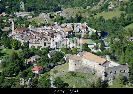 AERIAL VIEW. Perched castle overlooking the fortified town in the Upper Verdon Valley. Colmars-les-Alpes, Alpes-de-Haute-Provence, France. Stock Photo
