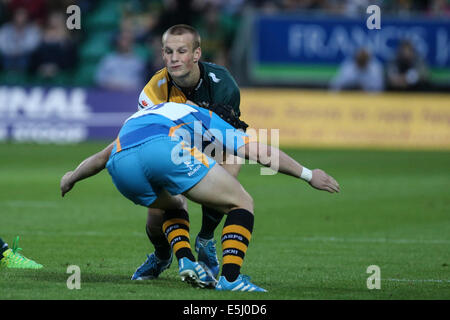 Northampton, UK. 01st Aug, 2014. Premiership Rugby 7s. Group C. Rory HUTCHINSON of Northampton Saints is tackled by Harry GLOVER of Wasps. Credit:  Action Plus Sports/Alamy Live News Stock Photo