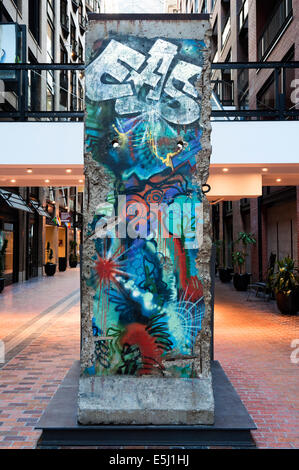 Piece of the Berlin wall exposed at Centre de Commerce Mondial (World Trade Center) in Montreal, province of Quebec, Canada. Stock Photo