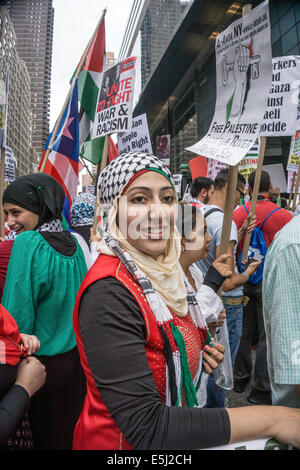 New York City, US. 1st Aug, 2014. Pretty young Muslim women in traditional headscarves wearing colors of the Palestinian flag are among pro Palestine demonstrators on 58th street near Columbus Circle. Credit:  Dorothy Alexander/Alamy Live News Stock Photo