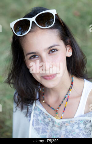 Head and shoulders portrait of a beautiful Latin American young woman Stock Photo